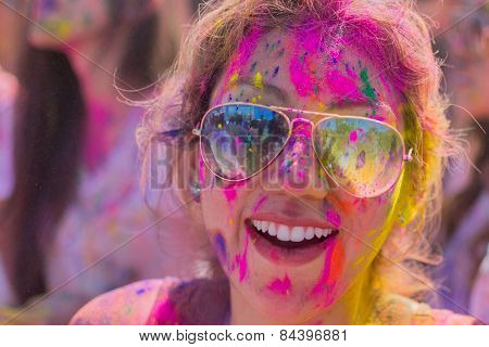 Smiling Woman With Glasses During