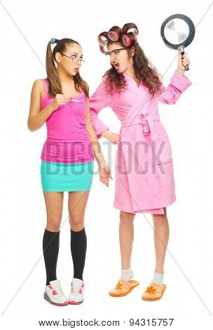 Angry mother screams to her daughter with pregnancy test isolated