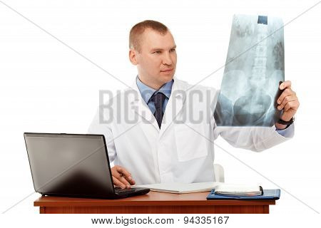 Portrait Of A Young Male Doctor In A White Coat