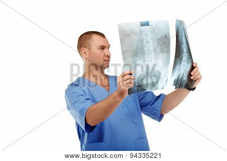 Portrait Of A Young Male Doctor In A Medical Surgical Blue Uniform