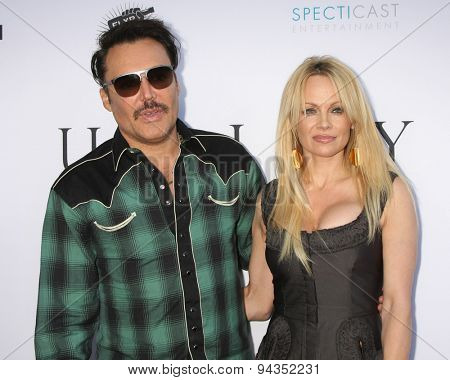 LOS ANGELES - JUN 24:  David LaChapelle, Pamela Anderson at the 