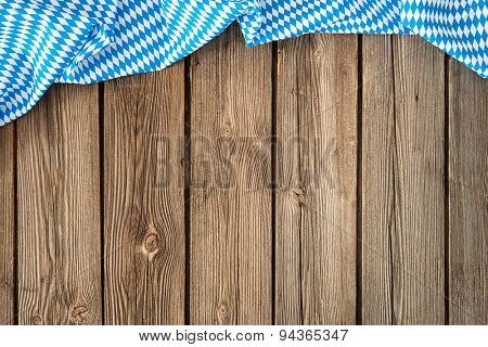 Rustic background for Oktoberfest with bavarian white and blue fabric