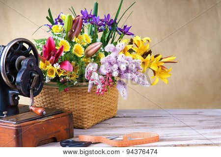 Flower arrangement with old sewing-machine