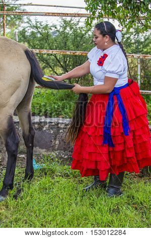 GUADALAJARA MEXICO - SEP 01 : Charra participates at the 23rd International Mariachi & Charros festival in Guadalajara Mexico on September 01 2016.