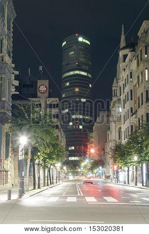 BILBAO, SPAIN - OCTOBER 24, 2016: Exterior view of the south east side of the Iberdrola tower at night. Headquarters of the electric company Iberdrola.