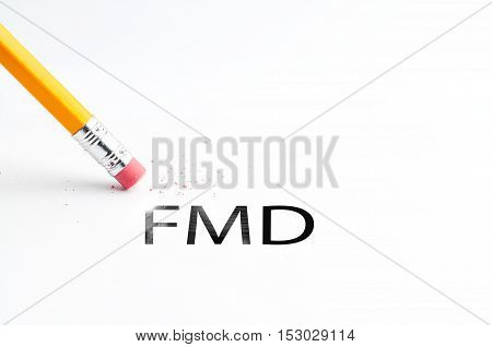 Closeup of pencil eraser and black FMD text. FMD. Pencil with eraser.