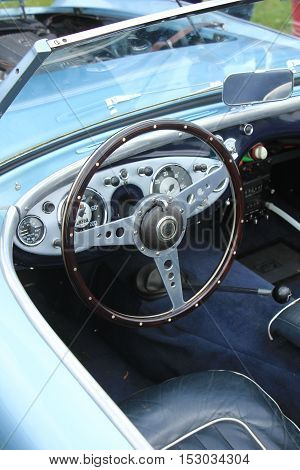 a Dashboard of a vintage sports car