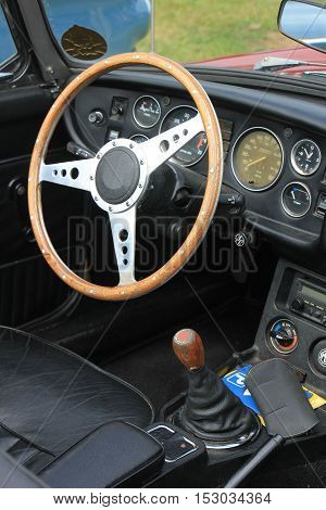 a Dashboard of a vintage sports car