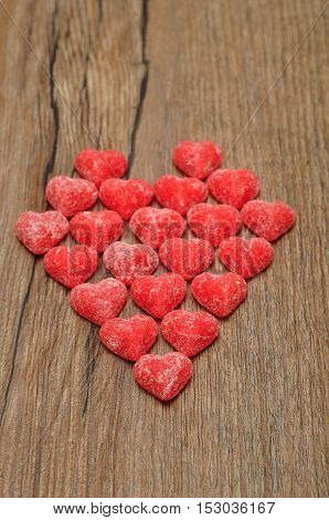 A heart made out of sugarcoated heart shape candy for valentines day
