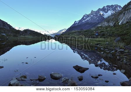 Reflection in lake while hiking to glacier grey, Chile