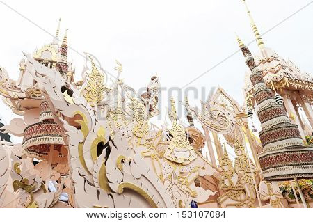Suratthani, Thailand - October 20, 2016: Details on ornamented carriers of Buddha images to be pulled across the city during the famous Chak Phra Festival, an annual Buddhist festival to celebrate the return of Buddha from heaven to earth after the end of