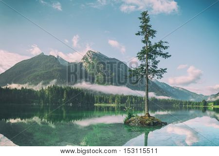 Amazing sunny summer day on the Hintersee lake in Austrian Alps, Europe. Toned like Instagram filter