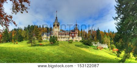Beautiful panorama with famous and medieval Peles castle in autumn season, Sinaia - Romania