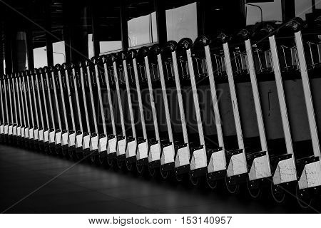 baggage trolleys at airport. Abstract Row of baggage cart in the airport