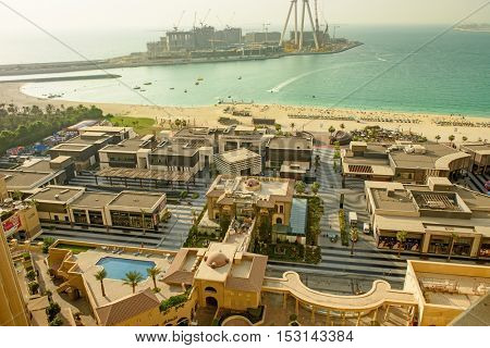 Dubai, UAE - OCTOBER 06, 2016: The Beach Development opposite Jumeirah Beach Residence (JBR) is an array of restaurants, shops and health and fitness venues including gyms and running track