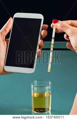 Testing urine with Reagent paper., color image