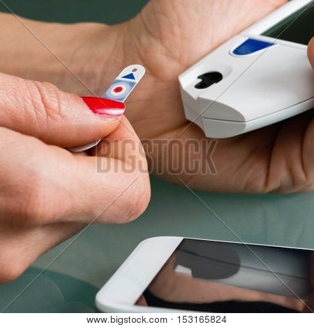 Placing Test Strip In Glaucometer