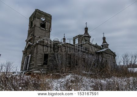 An old abandoned wooden Church of the Intercession of the Holy Virgin in Kamenka, Kursk region. in Russia