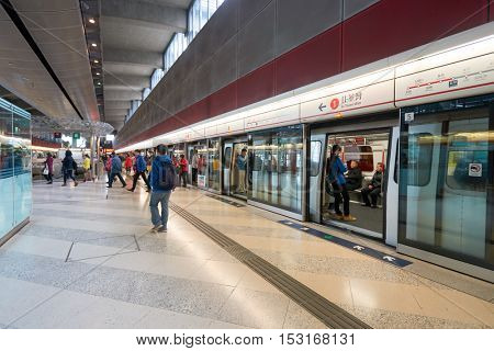 HONG KONG - CIRCA JANUARY, 2016: inside MTR station in Hong Kong. MTR is the rapid transit railway system in Hong Kong. It is one of the most profitable systems in the world