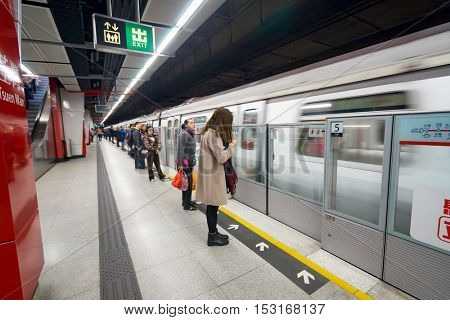 HONG KONG - CIRCA JANUARY, 2016: inside MTR station in Hong Kong. MTR is the rapid transit railway system in Hong Kong. It is one of the most profitable systems in the world