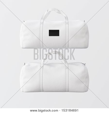 White cotton textile sport fashion bag with handles isolated at empty background.Clean black mockup label on the front side.Double sided mock up.3D rendering.