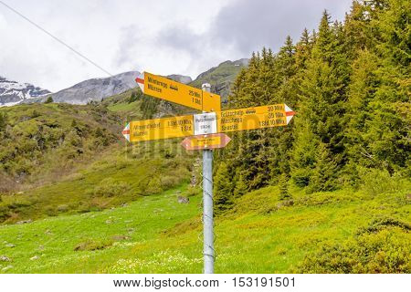 Beautiful Swiss mountain valley landscape with trail.