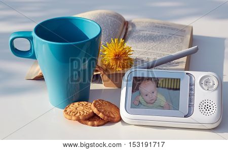 The close-up baby monitor for security of the baby on the table