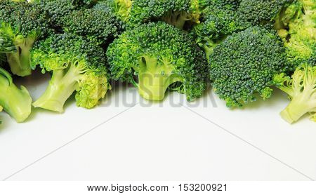 Macro closeup of green vegetables: cut broccoli. Broccoli texture closeup for any ideas. Fresh vegetables concept.