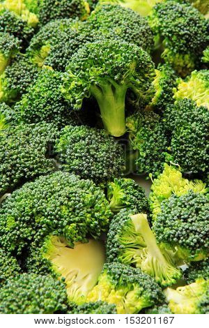Macro closeup of green vegetables: cut broccoli. Broccoli texture closeup for any ideas. Fresh vegetables concept.