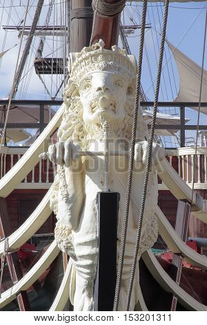 foreground of the figurehead lion shaped in an ancient warship