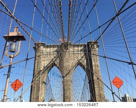 Brooklyn bridge and cable with blue sky, New York