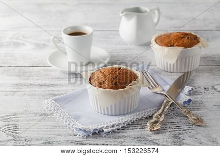 Cappuccino Coffee Cup With Muffin On White Table