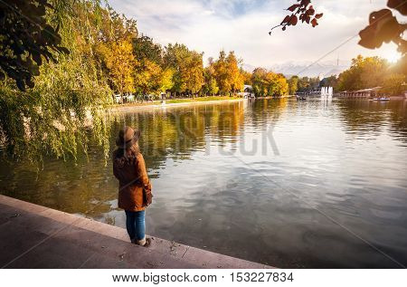 Woman Near The Lake At Autumn Park
