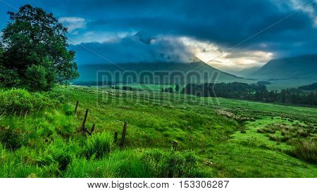 Foggy Dawn Over The Mountains Of Glencoe In Scotland