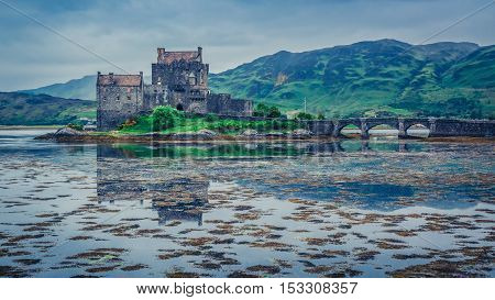 Sunset Over Lake At Eilean Donan Castle, Scotland