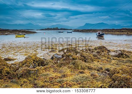 Boats On The Coast At Low Tide In Scotland