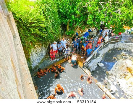 Soufriere Saint Lucia - May 12 2016: The tourists swimming at the Sulphur Springs Drive - in Volcano near Soufriere Saint Lucia