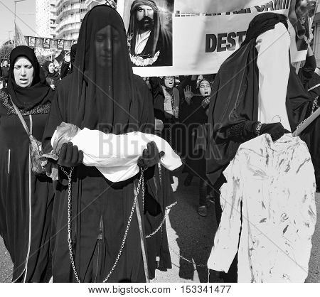 Istanbul Turkey - October 11 2016: Turkish Shia women takes part in an Ashura parade in Istanbul's district of Kucukcekmece. Turkish Shia Muslims mourning for Imam Hussain. Caferis take part in a mourning procession marking the day of Ashura in Istanbul's