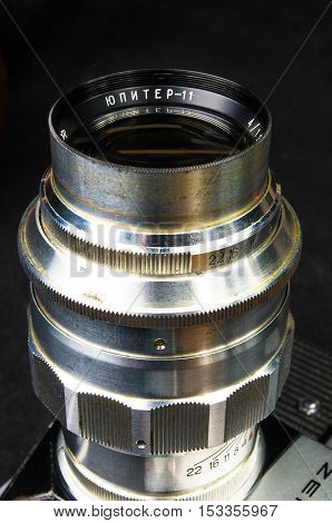 DONETSK, UKRAINE - May 07, 2016: old soviet film SLR camera Zenit - B with lens Jupiter-11, for use with 35 mm film, made in USSR in 1968 - 1973, manufactured by KMZ, with original leather case