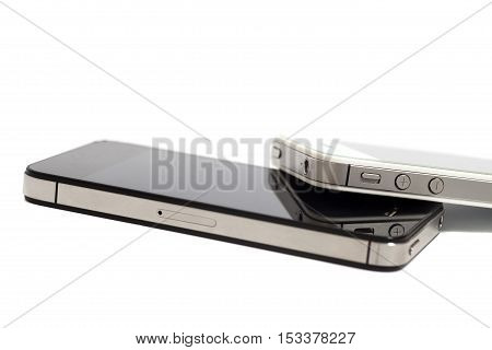 Black and white smartphones isolated on white background