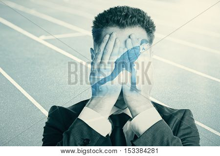 Businesspeople covering face and getting ready to run on abstract running track background. Fear of failure concept. Double exposure