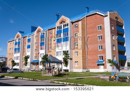 Modern apartment house in the village of Berezovka