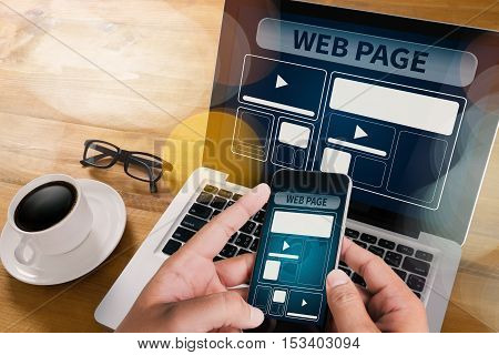 Web Design Template And  Web Page Closeup Shot Of Laptop With Digitaltablet And Smartphone On Desk.