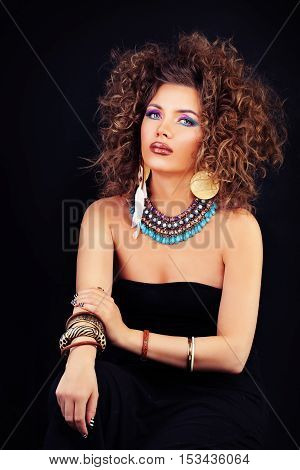 Sensual Woman Fashion Model with Makeup and Permed Hairstyle