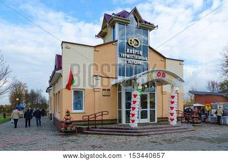 SENNO BELARUS - OCTOBER 8 2016: Unidentified people are strolling near new building of Civil Registry Office during traditional event 