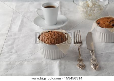 Homemade Sponge Cake With Dried Cranberries And Cup Of Coffee.selective Focus On The Sponge Cake