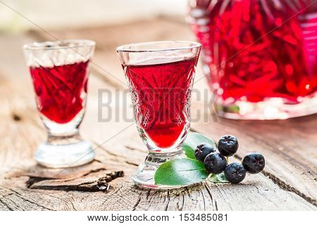 Fresh Liqueur Made Of Chokeberries And Alcohol