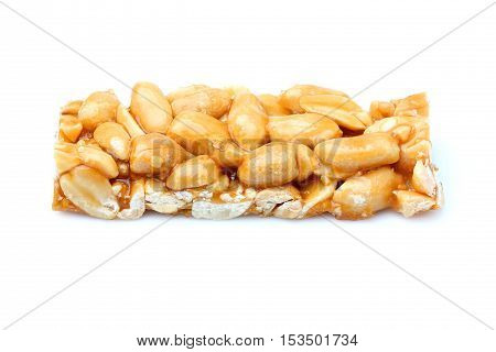 Candy bar made of peanuts.Isolated on white background.