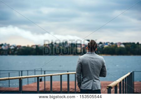 Men With Beard Smoking Electronic Cigarette Outdoor
