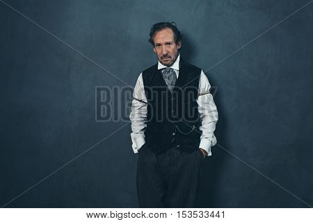 Vintage 1900 Western Man Leaning Against Wall.